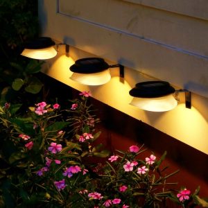 Punch-free Flying Saucer Solar Lamp Outdoor Garden Decoration Wall Lamp (Black Shell Warm Light)