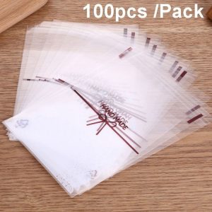 100pcs / Pack 7x7cm White Lace Bow Biscuit Self-Adhesive Bags Baking Packaging